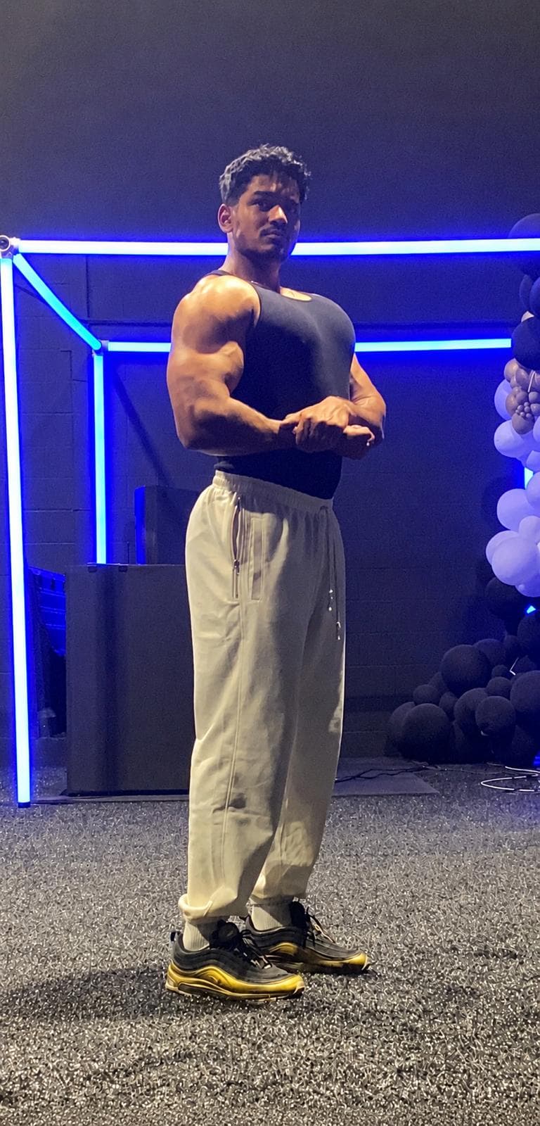 KT posing at the gym